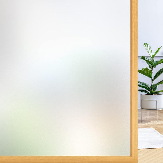 Frosted privacy window film providing natural light and complete privacy in bathroom
