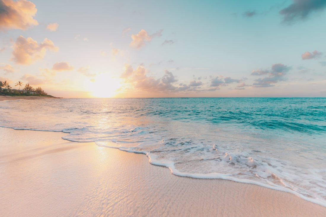 Beautiful summer beach with clear blue water and sunshine