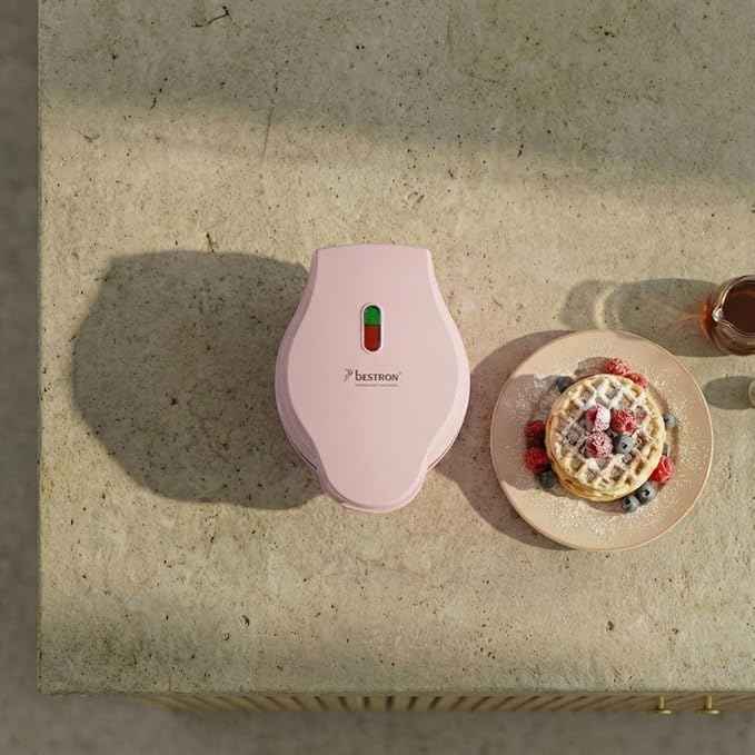 Bestron Mini-Waffeleisen für klassische Waffeln, kleiner Waffelmaker mit Antihaftbeschichtung, für Kindergeburtstage, Familienfeiern, Ostern oder Weihnachten, Retro Design, 550 Watt, Farbe: Rosa