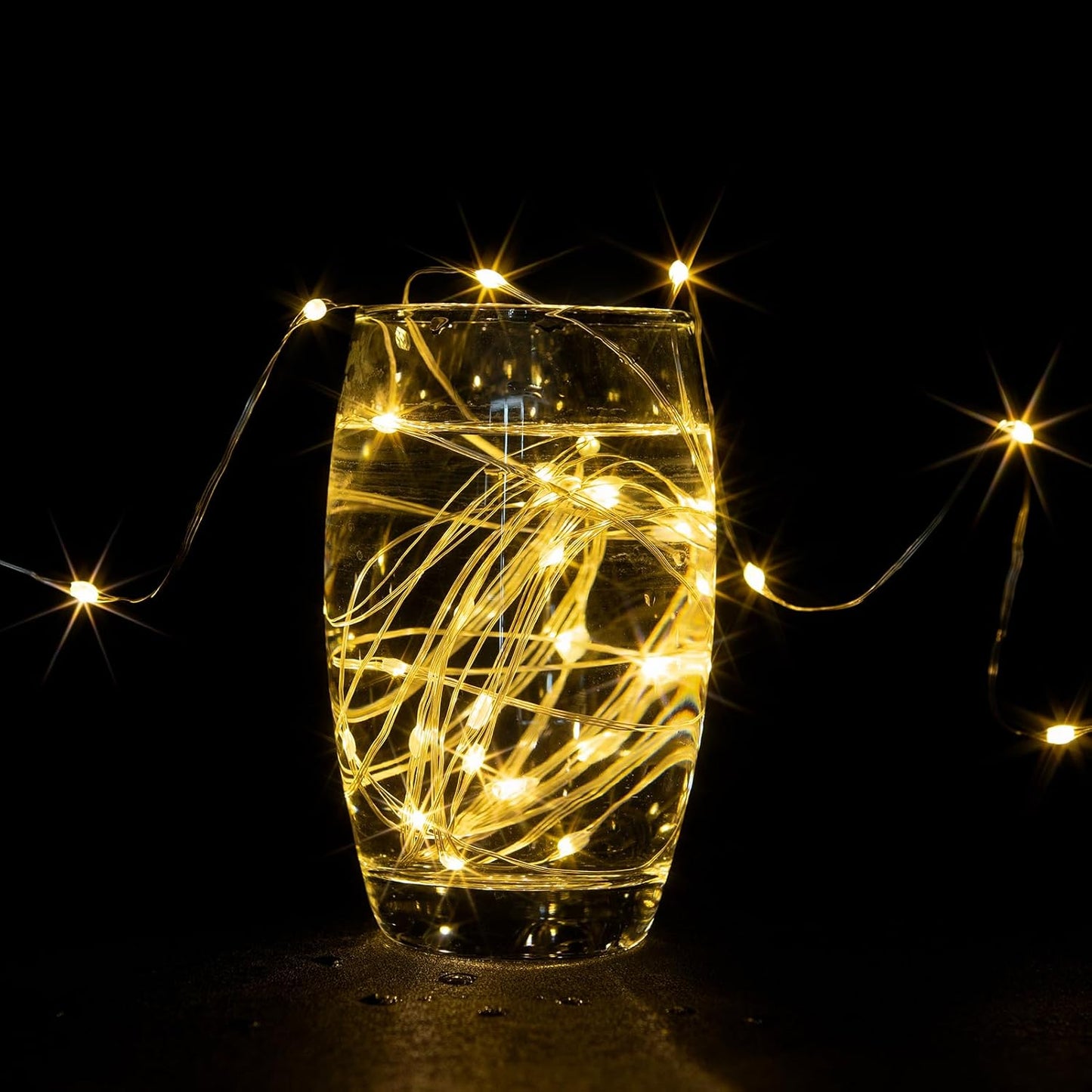 Fairy Lights Plug in,200FT 600LEDs Waterproof Led String Lights,8 Modes Remote Twinkle Light for Outdoor Indoor Christmas Wedding Birthday Garden Party Decorations,Silver Wire,Warm White