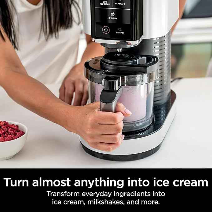 Ninja CREAMi Ice Cream Maker, 5 One-Touch Programs, Includes (2) 16oz Pints with Lids, Transform Frozen Bases to Ice Cream, Sorbets, Milkshakes, Vegan, Dairy-Free Options, NC300 White (Renewed)