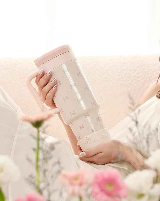40 oz Insulated Tumbler with Handle and Push-Button Straw Lid, Stainless Steel Travel Cup for Gym Office, Leakproof, BPA-Free, Cup Holder Friendly, Bow Silicone Boot, Cream (Bow Cream)