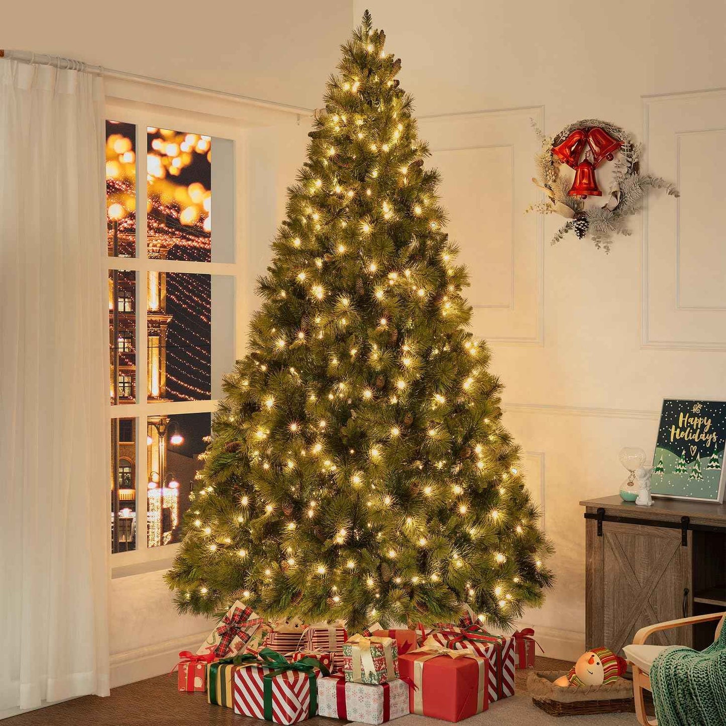 Naomi Home Vail 9ft Prelit Artificial Christmas Tree with Pine Cones, Foot Pedal, 2294 Branch Tips, 1050 Warm Lights and Metal Stand, 62" Wide Realistic Traditional Christmas Tree with Lights