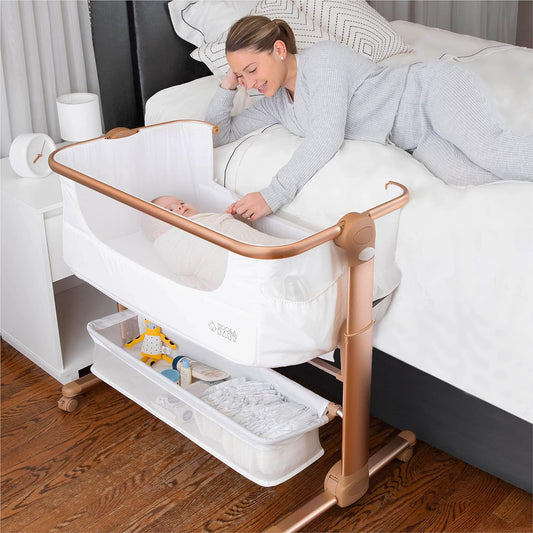 KoolerThings Baby Bassinet, Bedside Sleeper for Baby, Easy Folding Portable Crib with Storage Basket for Newborn, Bedside Bassinet, Comfy Mattress/Travel Bag Included (Bassinet) (White & Gold)